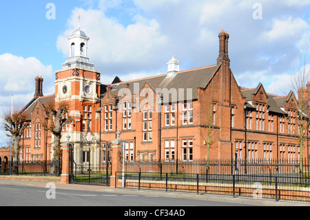 Gates & front of Brentwood School main brick building private independent day & boarding school education with clock tower in Brentwood, Essex England Stock Photo