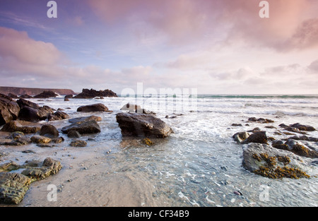 View of Irish sea, and rock strewn coastline at Marloes Sands Pembrokeshire (National Trust) Wales UK Stock Photo