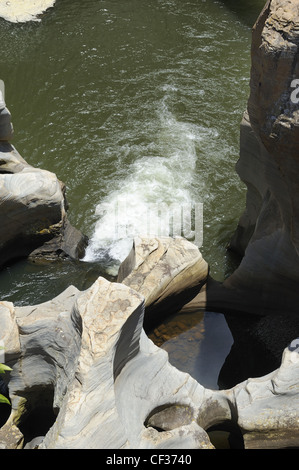 Water flowing out of potholes at Bourkes Luck Potholes South Africa Stock Photo