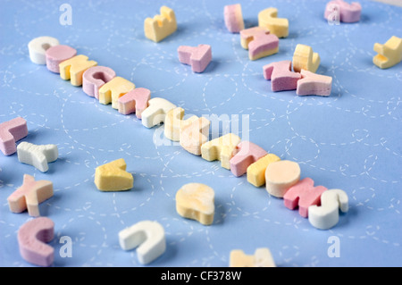 Sugar letter shaped sweets spelling the word congratulations Stock Photo