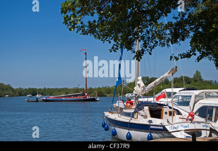 Boats moored at Ranworth Staithe fronting Malthouse Broad in the Norfolk Broads. Stock Photo