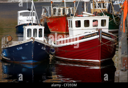 Fishing boats in Ullapool harbour. Stock Photo