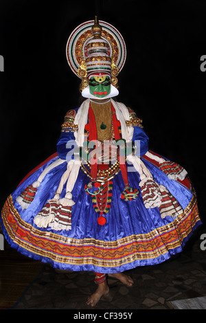 Traditional Kathakali Hindu performer isolated on black background ...