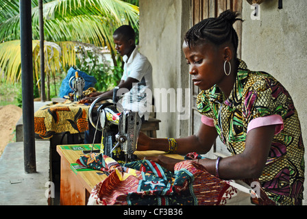 Tailor at work on a sewing machine in Bo, Sierra Leone Stock Photo