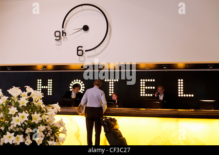 Israel, Tel Aviv,business man checking into a hotel Stock Photo