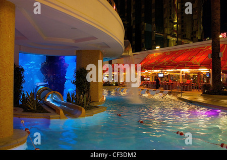 Pool at the Golden Nugget, which includes a waterslide that passes through a fish tank, in downtown Las Vegas, Nevada Stock Photo