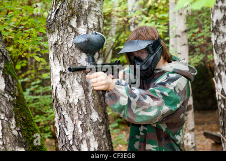 paintball player in the forest Stock Photo