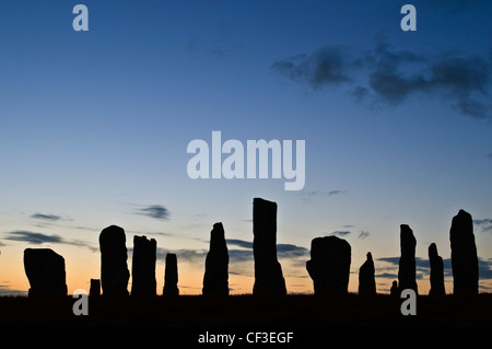 A silhouette of the ancient standing stones of Callanish 1 in the Isle of Lewis. Stock Photo