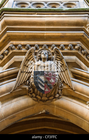 Ornate detail on the coat of arms on the door leading to Exeter College in Oxford. Stock Photo