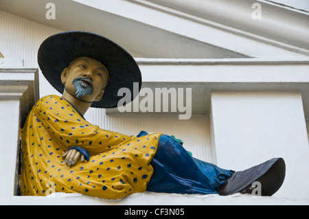 An Asian figure above the doorway to Twinings teashop, still at its original location on the Strand since it was first opened as Stock Photo