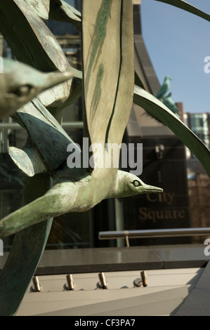 Close up of a bird sculpture on an office building in Leeds City Square. Stock Photo