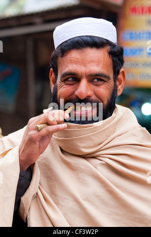 Chewing stick, wooden tooghbrush, Islamabad, Pakistan Stock Photo