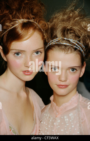 Boyd Backstage London Spring Summer Model Lily Cole messy red hair off face tied plaited grey and yellow string and model Stock Photo