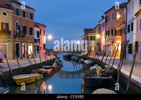 Canal reflections at dusk in Burano island - Venice, Venezia, Italy, Europe Stock Photo
