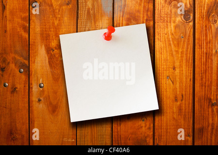 the blank paper note on wood board background Stock Photo