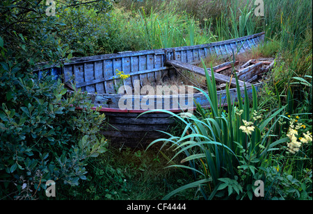 Abandoned old blue boat. Stock Photo