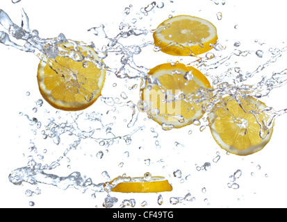 slices of lemons splashed with water Stock Photo