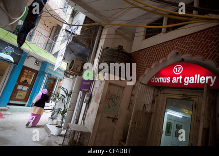 Boutiques and shops in Hauz Khas village, in south Delhi, India. Close to the ruins of Feroz Shah's 14th century medrassa. Stock Photo