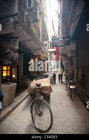 Boutiques and shops in Hauz Khas village, in south Delhi, India. Close to the ruins of Feroz Shah's 14th century medrassa. Stock Photo