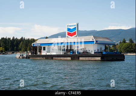 Chevron gas station on the water in the harbor at Vancouver, British Columbia, Canada Stock Photo