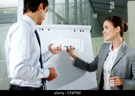 Two business colleagues working on project together Stock Photo