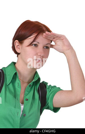Young redheaded woman looking hard in the distance. Stock Photo