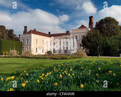 Hintlesham Hall, a stunning 16th century Elizabethan Grade I listed country house hotel with an elegant Georgian facade, in beau Stock Photo