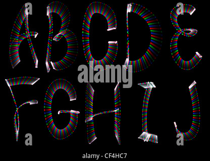 Bright rainbow letters, part of english alphabet on black background. Isolated. Stock Photo