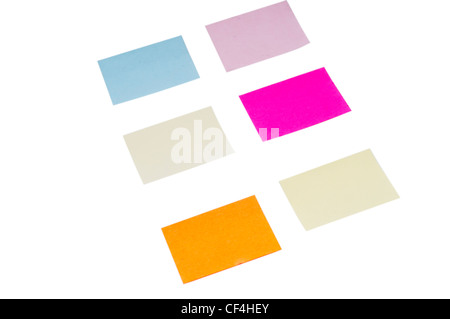 A set of colorful sticky notes in various sizes and shades on a white background. Ideal for office planning, creative organization, and study visuals. Stock Photo
