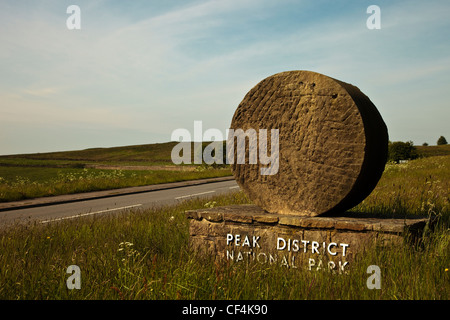 A Peak District National Park sign, Britain's first national park, established in 1951, by the roadside. Stock Photo