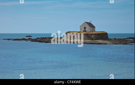 St Cwyfan's Church, known as the Church in the Sea, on a small tidal island called Cribinau off the coast of Anglesey.