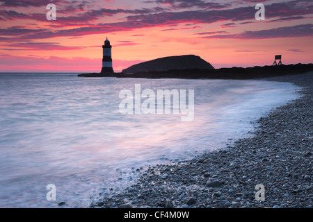 Penmon lighthouse and Puffin Island at Penmon Point on the Isle of Anglesey. Stock Photo