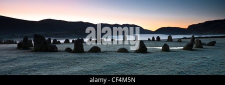 A misty morning at the Castlerigg Stone Circle, one of the most visually impressive prehistoric monuments in Britain. Stock Photo