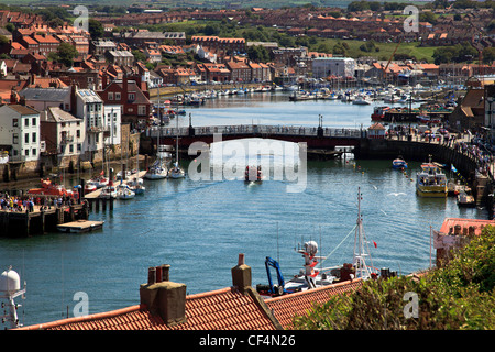 The swing bridge designed by J Mitchell Moncrieff across the River Esk in Whitby Harbour. Stock Photo