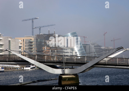 The Millennium Bridge over the River Liffey in Dublin. The pedestrian bridge connects Temple Bar to the North Quays. Stock Photo