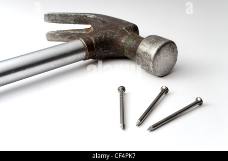 Hammer and nails on white background Stock Photo