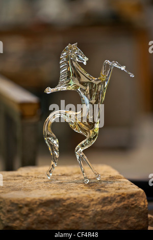 Art glass blower from Murano forms a figure Stock Photo