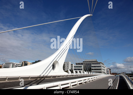 Samuel Beckett Bridge, a cable-stayed bridge that joins Sir John Rogerson's Quay to North Wall Quay across the River Liffey. The