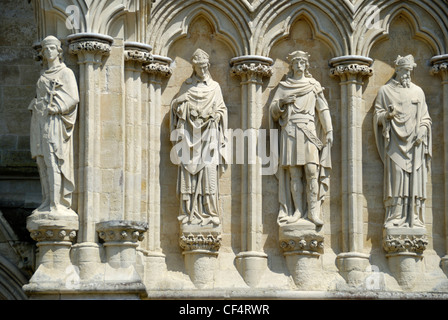 Statues of Saints and allegorical figures on the exterior of Salisbury Cathedral.