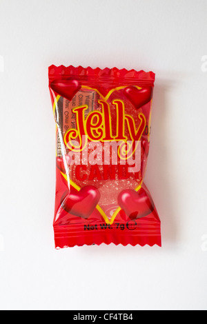 packet of heart shaped jelly candy hearts isolated on white background - sweets candies Stock Photo