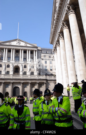 Police guarding the Bank of England and the Royal Exchange during the G20 demonstrations in the City of London. Stock Photo