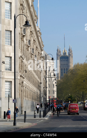 A view along Millbank towards Victoria Tower and the Palace of Westminster. Stock Photo