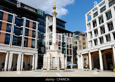 View of Paternoster Square showing the Paternoster Square Column and modern office buildings. Stock Photo