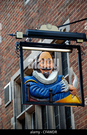 A pub sign featuring a likeness of William Shakespeare outside Shakespeare's Head pub in Carnaby Street. Stock Photo