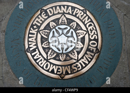 Pavement plaque marking the route of the Diana Princess of Wales Memorial Walk. The walk takes visitors through four London park Stock Photo