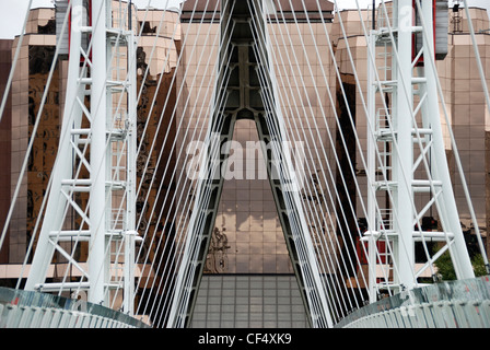 The Lowry Bridge linking the Lowry Centre and the Imperial War Museum North at Salford Quays in Greater Manchester. Stock Photo