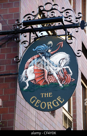 The George Inn sign outside London's only surviving galleried coaching inn, in Borough High Street. Stock Photo