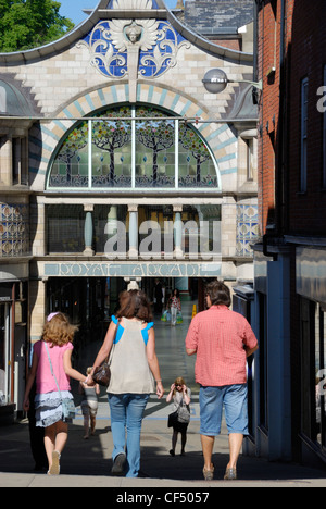 A family entering the Royal Arcade, built in 1899 on the site of the yard of the Royal Hotel. Stock Photo