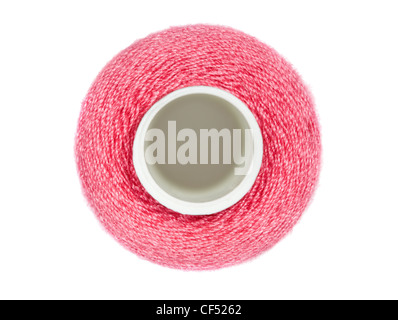 coil with red sewing threads isolated on white background, top view Stock Photo