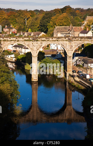 The 19th century viaduct crossing the River Nidd viewed from the Castle Gardens. Stock Photo